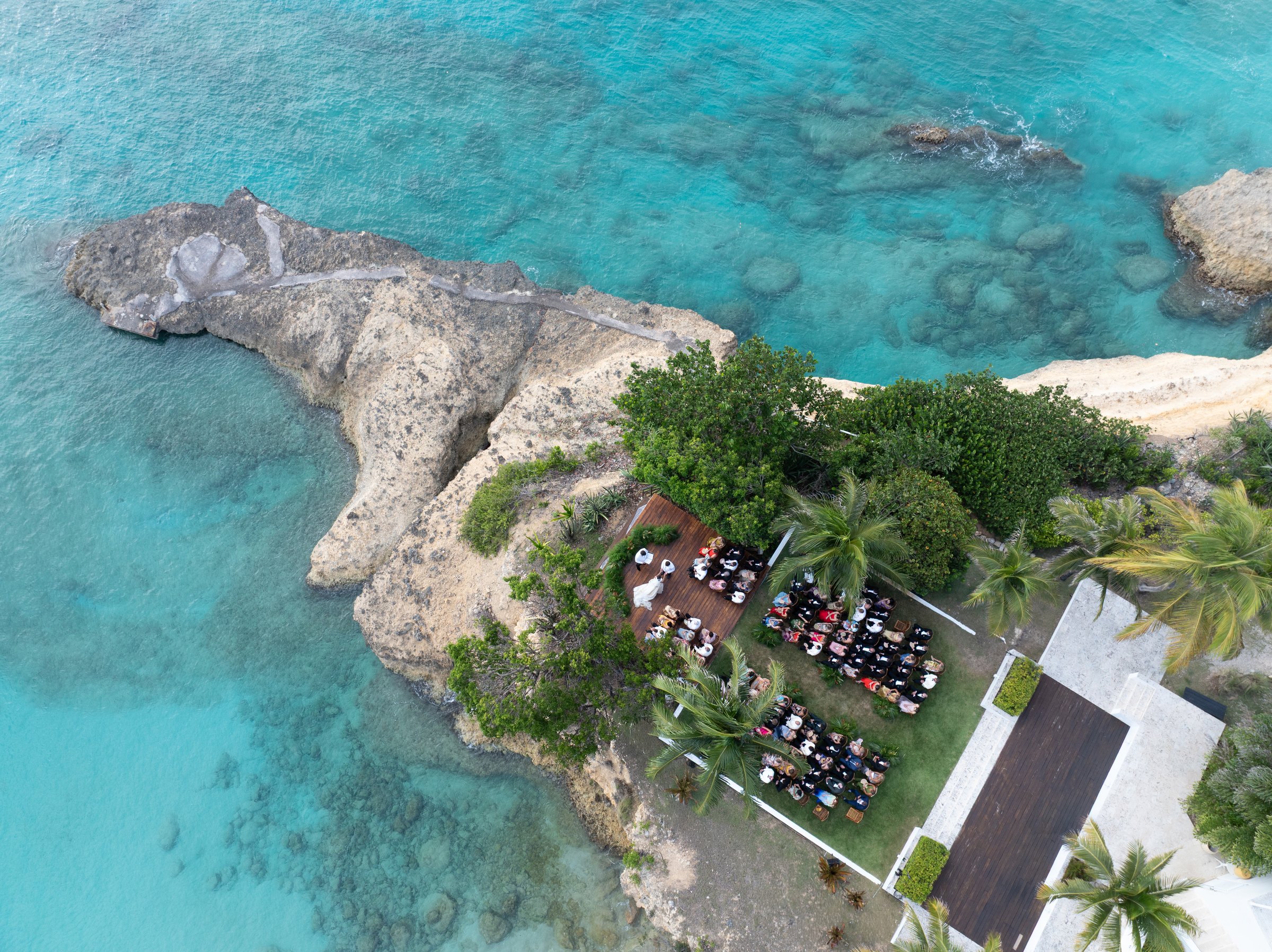 Aerial of Mara & Ellis's cliffside ceremony at Malliouhana, Anguilla