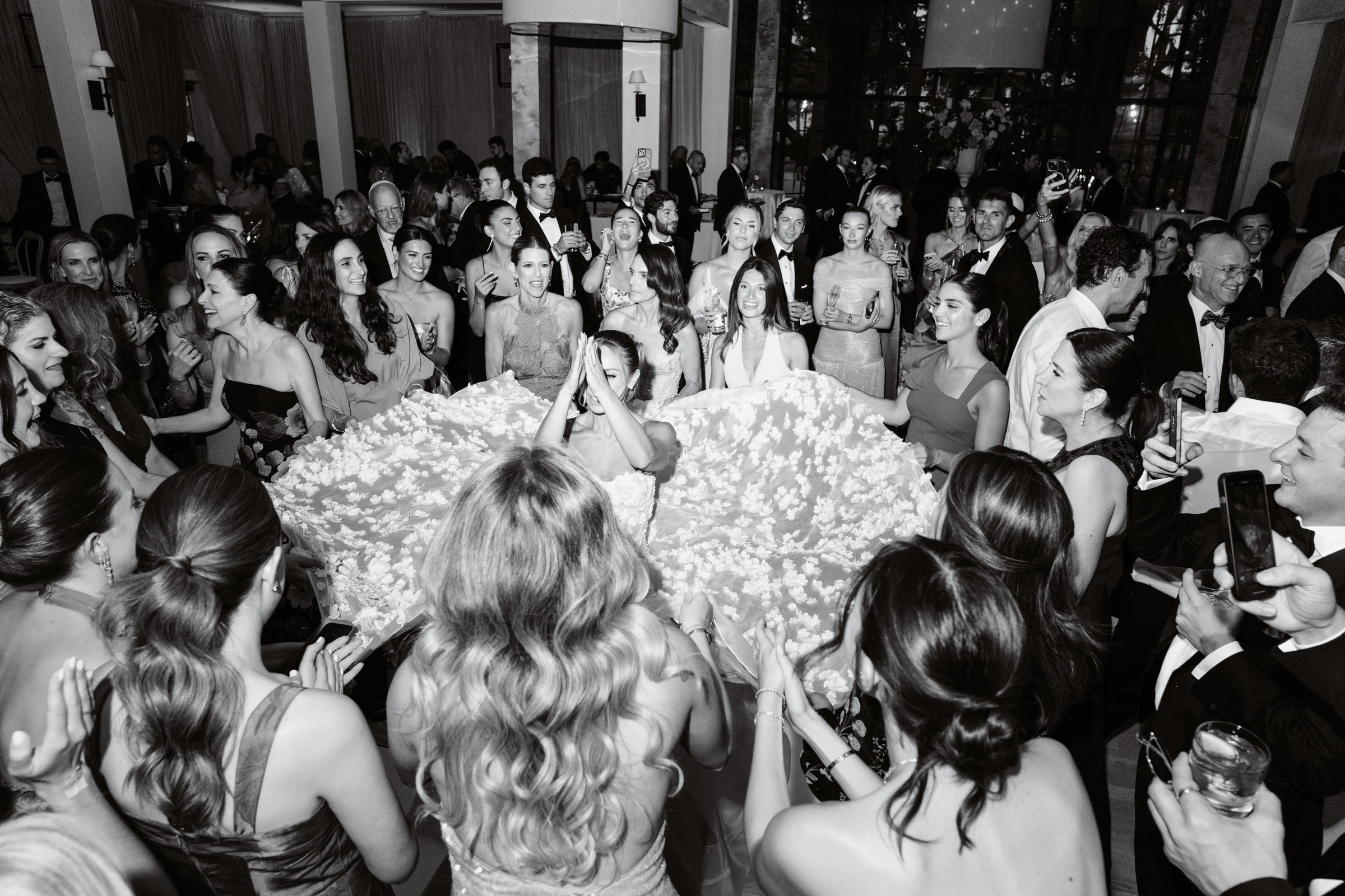 The hora — Paige lifted up by family and friends