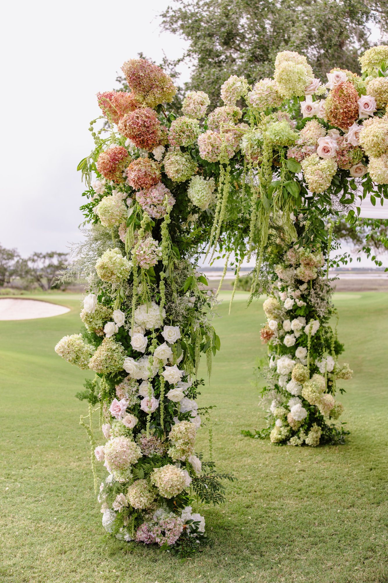 The hydrangea-and-amaranthus ceremony florals