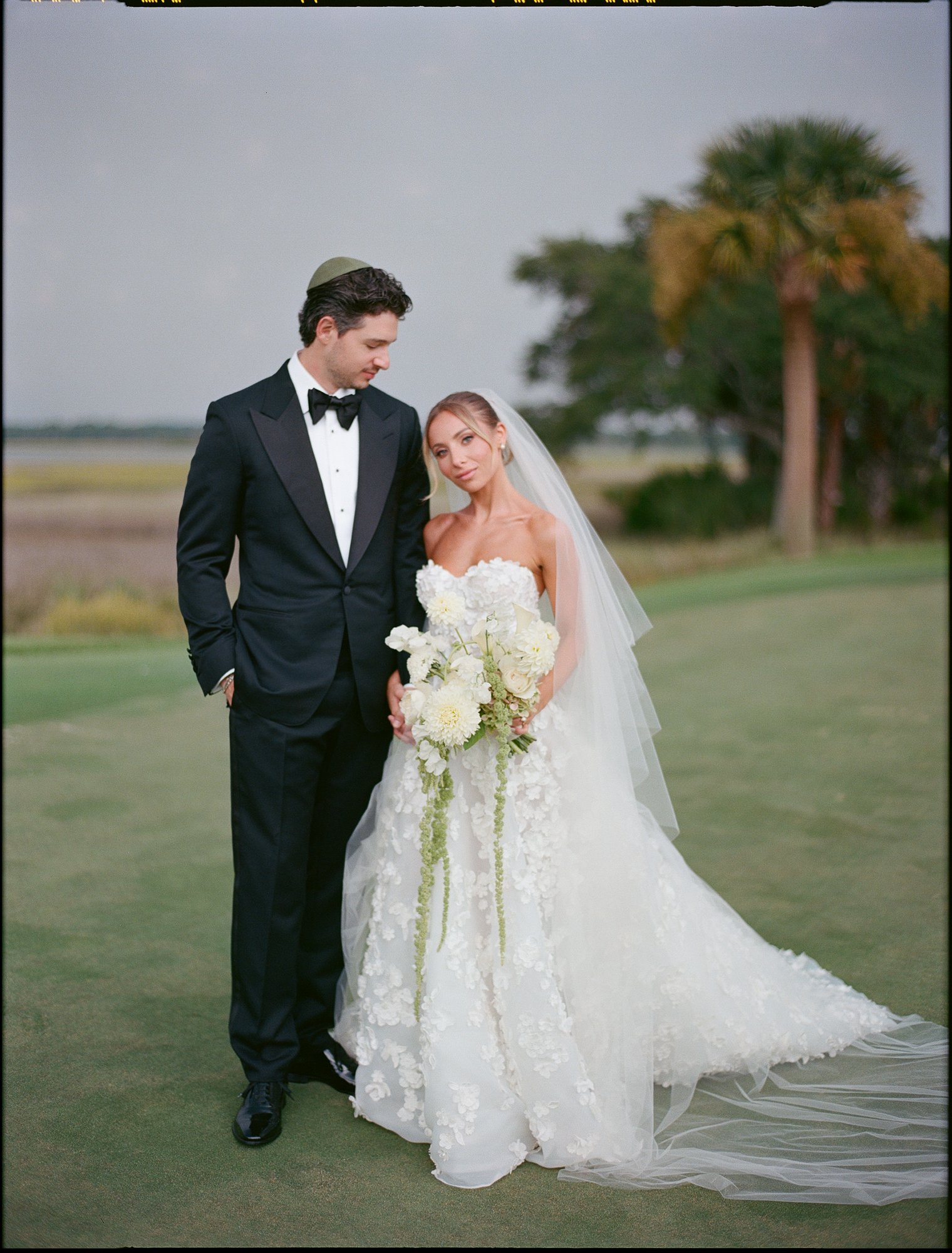 Paige and Jake on the marsh-side green